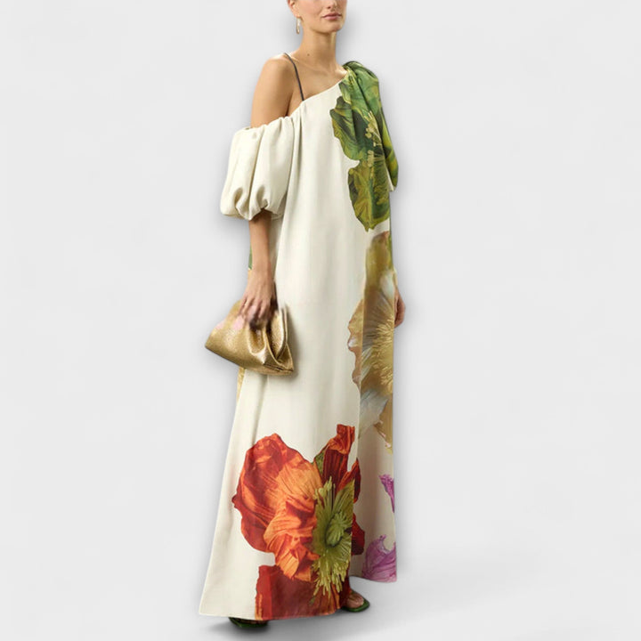 Skylar - Robe longue imprimé floral avec encolure asymétrique et manches bouffantes