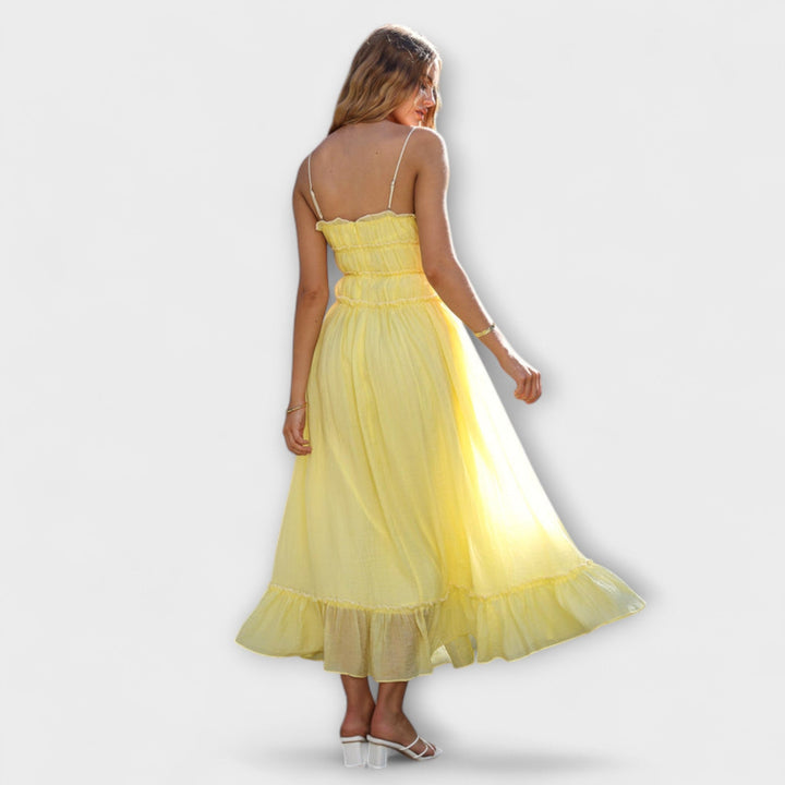 Celine - Robe midi sans manches à ourlet à volants