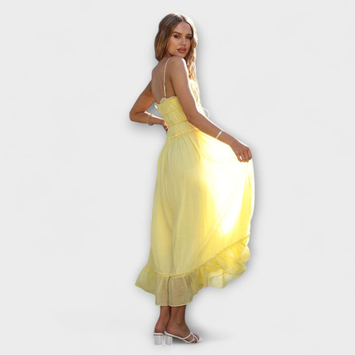 Celine - Robe midi sans manches à ourlet à volants