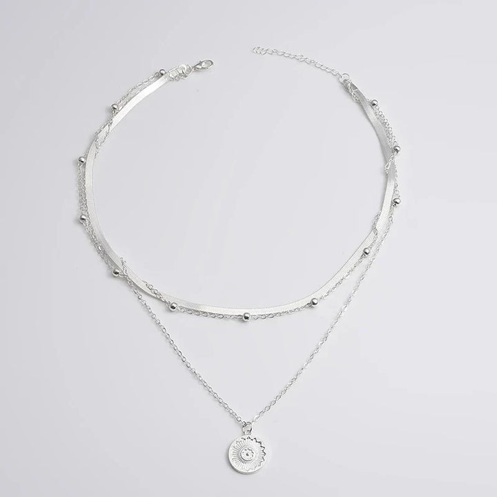 Collier triple