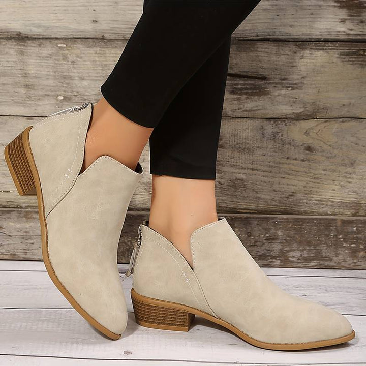 Diana | Bottines élégantes à la cheville, bout pointu et détails perforés