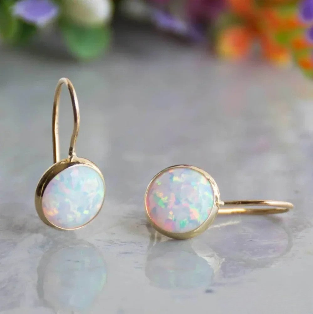 Boucles d'oreilles rétro en or avec pierre d'opale