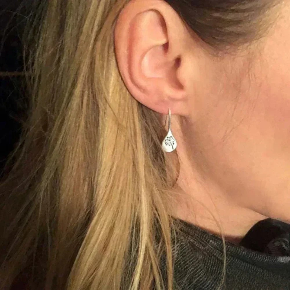 Boucles d'oreilles élégantes en argent au design feuille de pissenlit