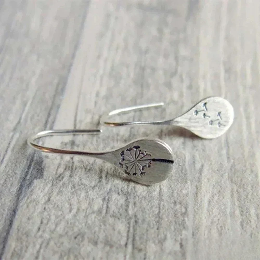 Boucles d'oreilles élégantes en argent au design feuille de pissenlit
