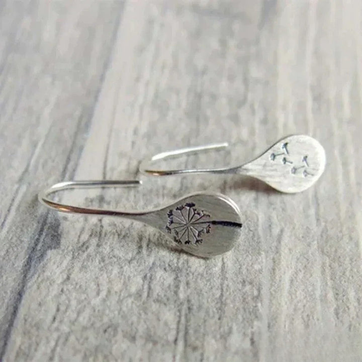 Boucles d'oreilles élégantes en argent au design feuille de pissenlit