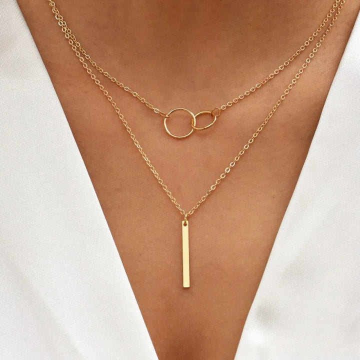 Collier pendentif double cercle rétro doré