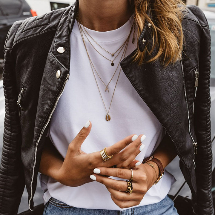 Veste en cuir femme motard avec fermeture éclair, poches, manches côtelées, blouson moto.