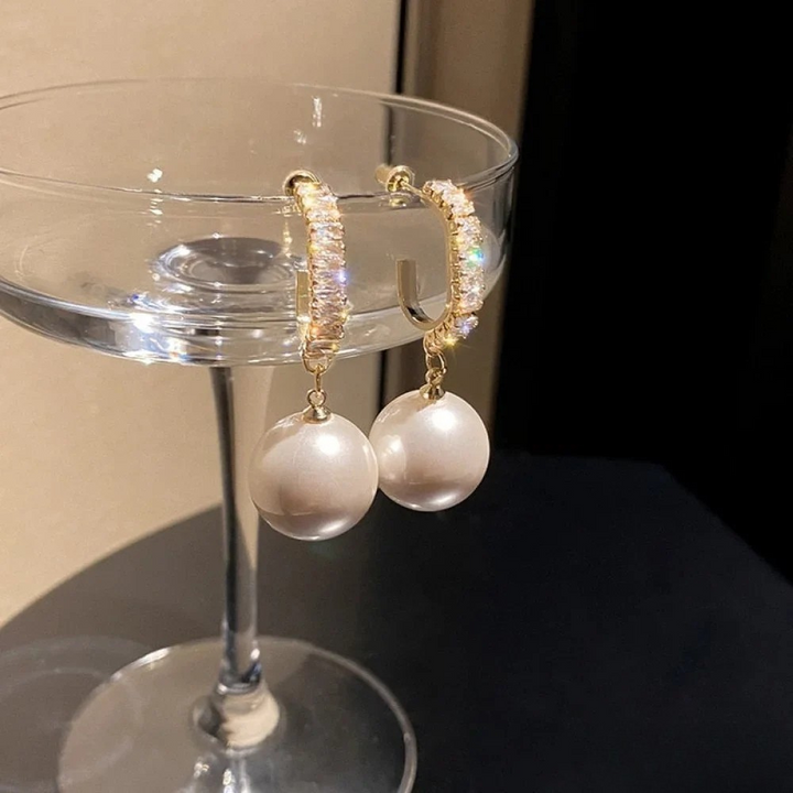 Boucles d'oreilles élégantes avec perles et zirconium