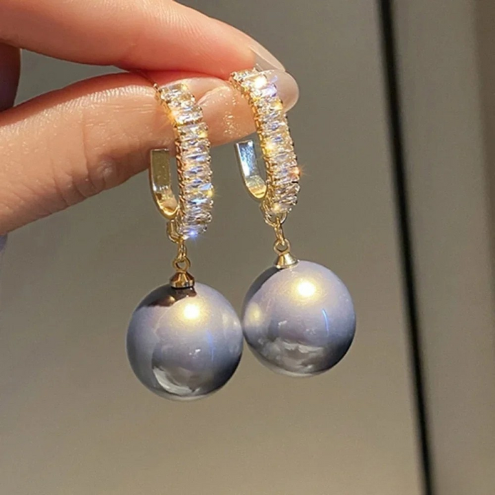Boucles d'oreilles élégantes avec perles et zirconium
