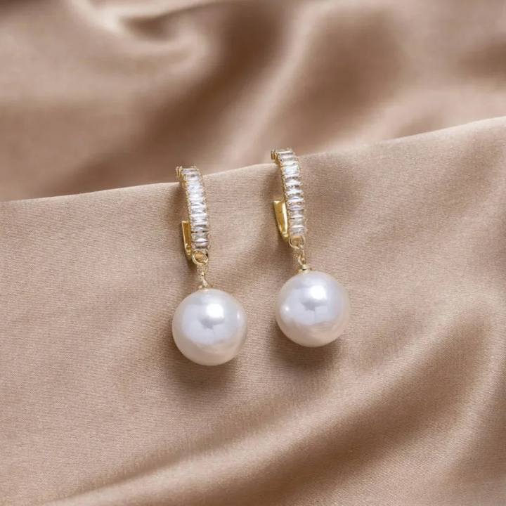Boucles d'oreilles élégantes avec perles et zirconium
