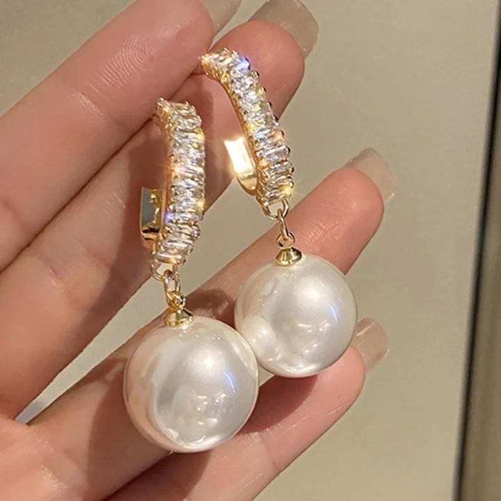 Boucles d'oreilles élégantes avec perles et zirconium