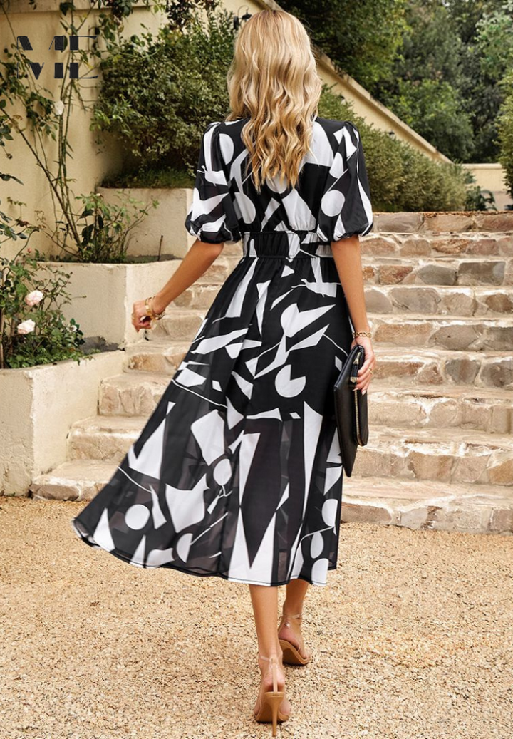 Monica | Robe midi florale avec manches bouffantes