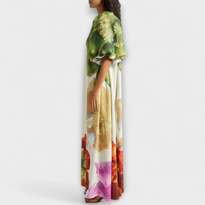 Skylar - Robe longue imprimé floral avec encolure asymétrique et manches bouffantes