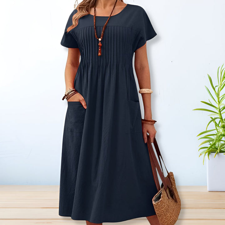 Leonie | Robe midi plissée avec poches