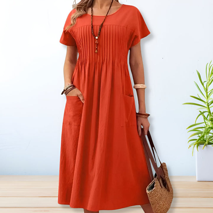 Leonie | Robe midi plissée avec poches