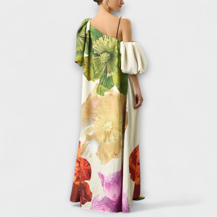 Skylar - Robe longue imprimé floral avec encolure asymétrique et manches bouffantes