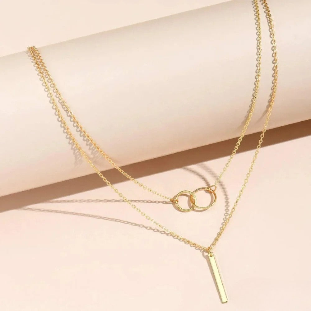 Collier pendentif double cercle rétro doré