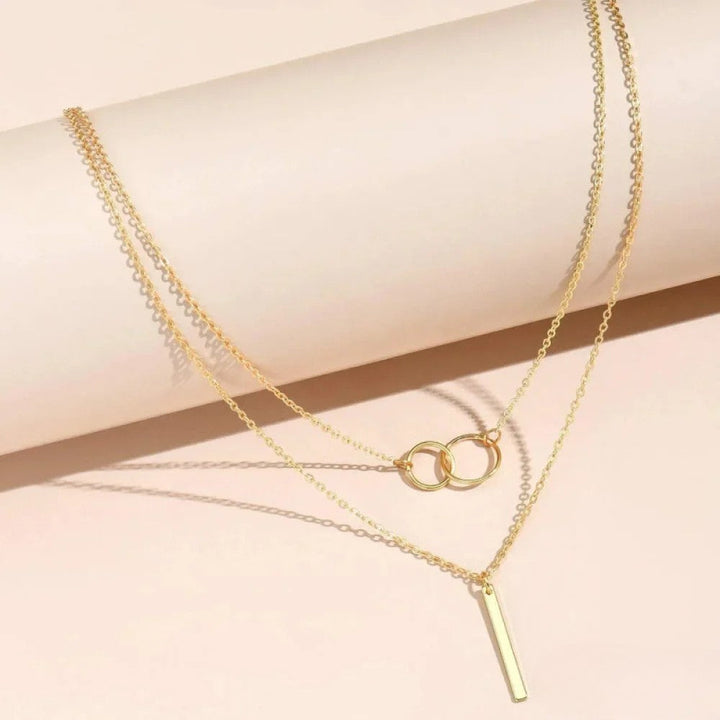 Collier pendentif double cercle rétro doré
