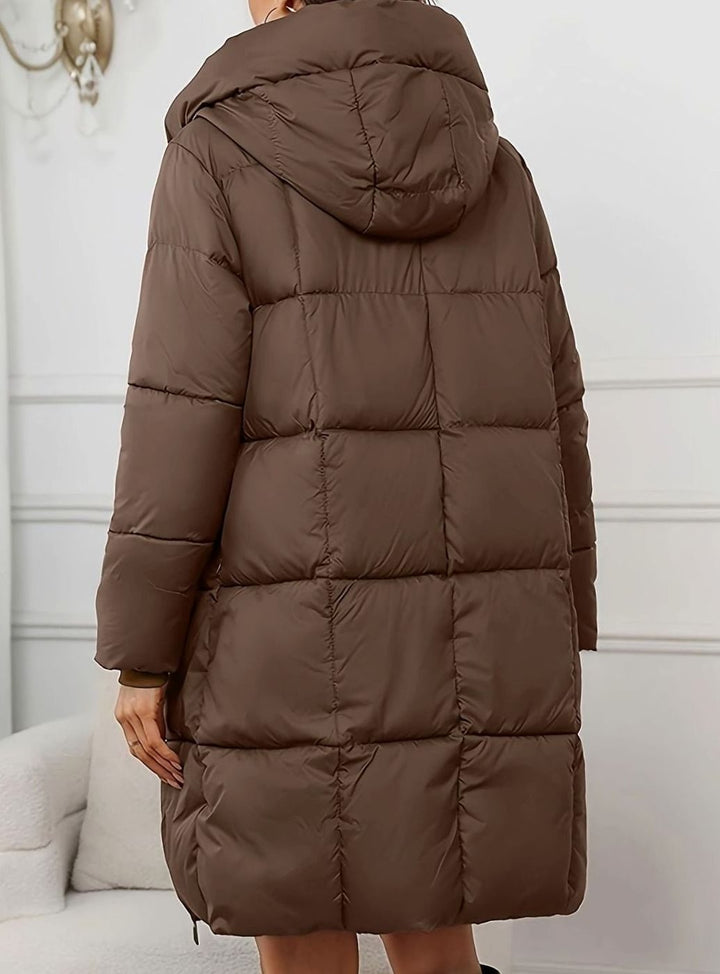 Ludmilla | Veste matelassée longue raffinée avec capuche réglable et fermeture éclair intégrale