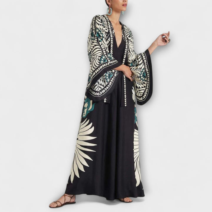 Giselle - Robe maxi fluide à imprimé floral stylé