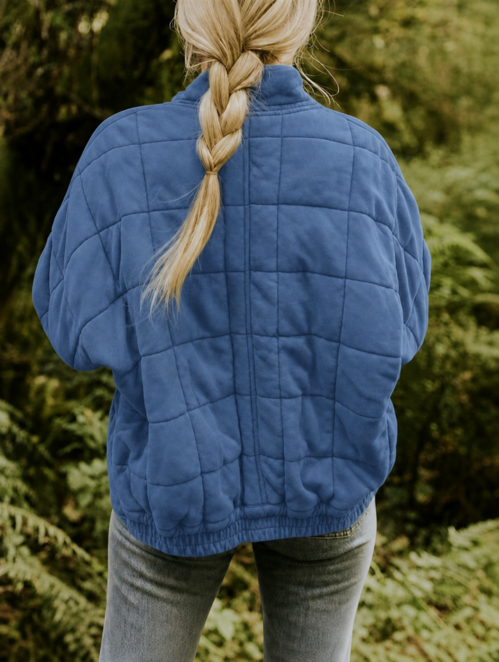 Ingrid | Veste matelassée structurée à col montant et fermeture zippée sur le devant