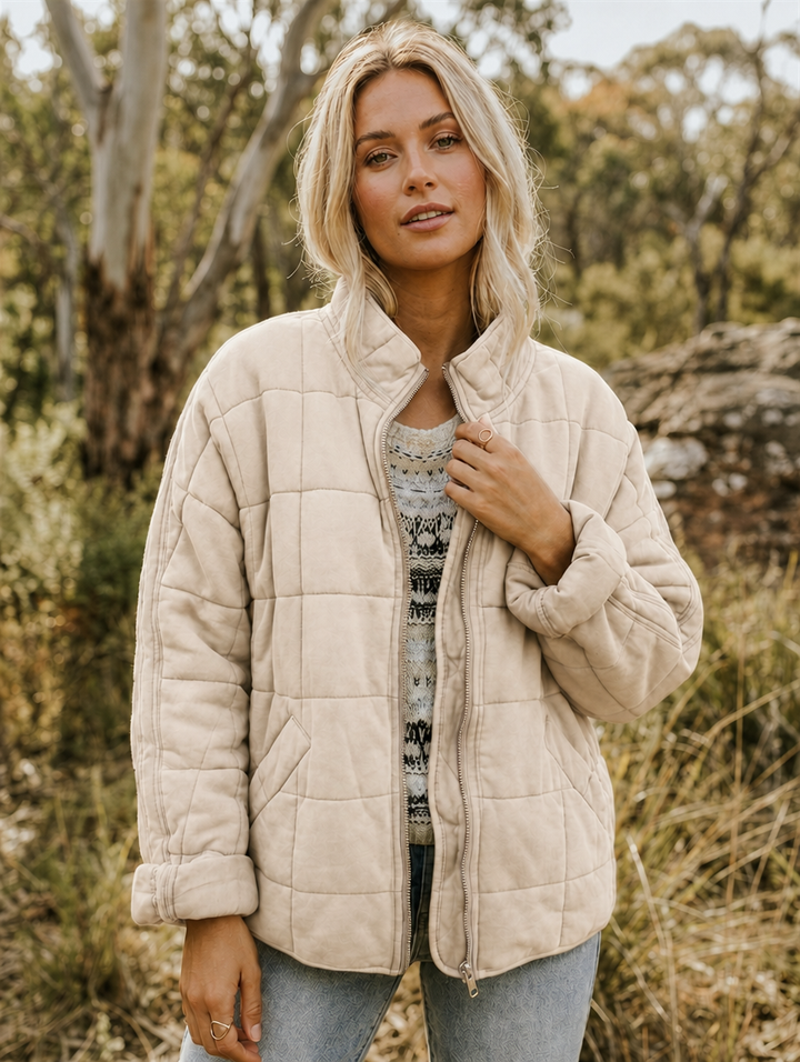 Ingrid | Veste matelassée structurée à col montant et fermeture zippée sur le devant