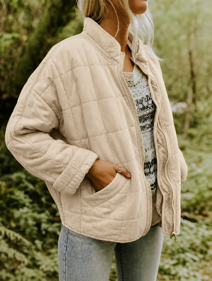 Ingrid | Veste matelassée structurée à col montant et fermeture zippée sur le devant